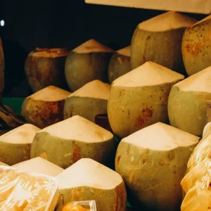 Trimmed young drinking coconuts