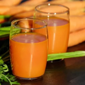 Two glasses of fresh orange carrot juice